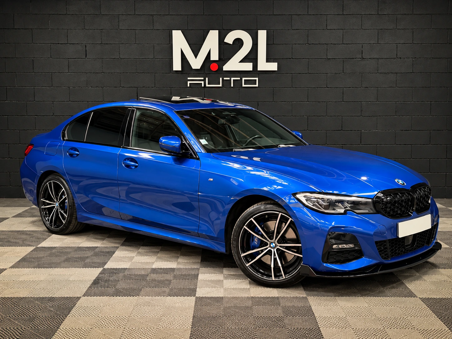 BMW bleue vendue par M2L AUTO